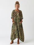 Aleta | Vestido oversize con bolsillos bordados y botonadura delantera