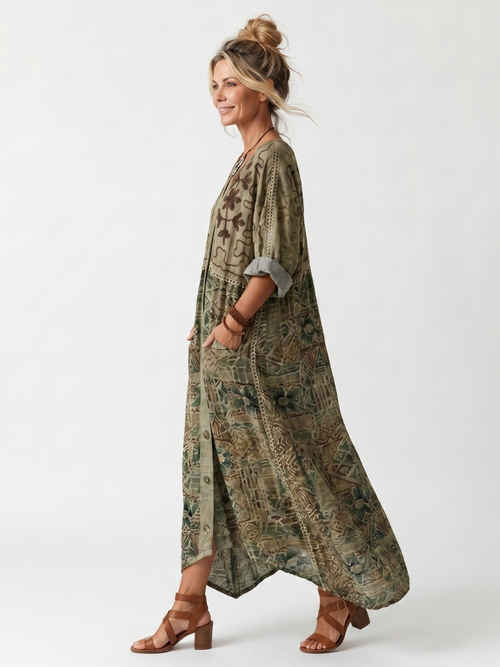 Aleta | Vestido oversize con bolsillos bordados y botonadura delantera
