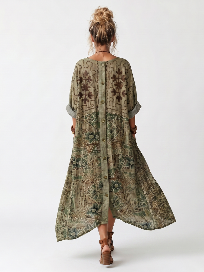 Aleta | Vestido oversize con bolsillos bordados y botonadura delantera